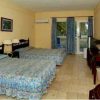 Club Amigo Marea del Portillo - Bungalow Triple - Todo Incluido triple